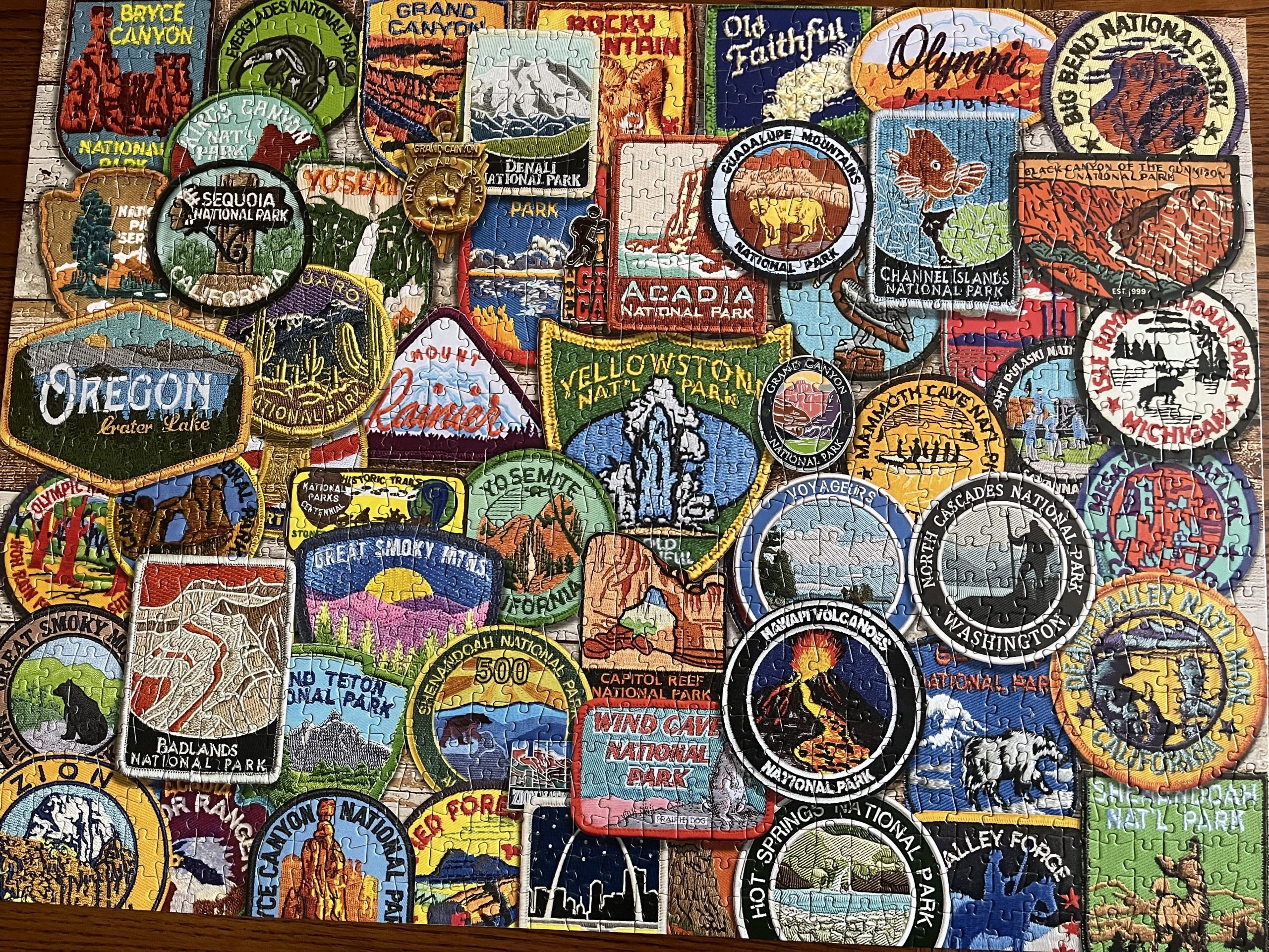 A puzzle showing multiple overlapping badges from many American national parks